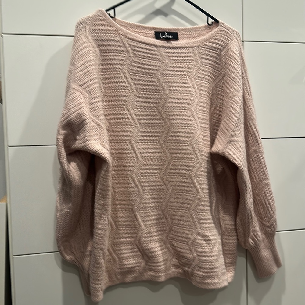 LuLu’s pink sweater